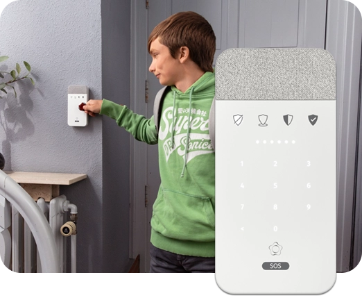 Taustalla lapsi käyttämässä käyttönäppäimistöä, etualalla Verisuren käyttönäppäimistö.