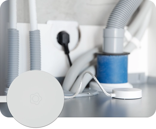 Vesi- ja vuotovahti allaskaapissa.